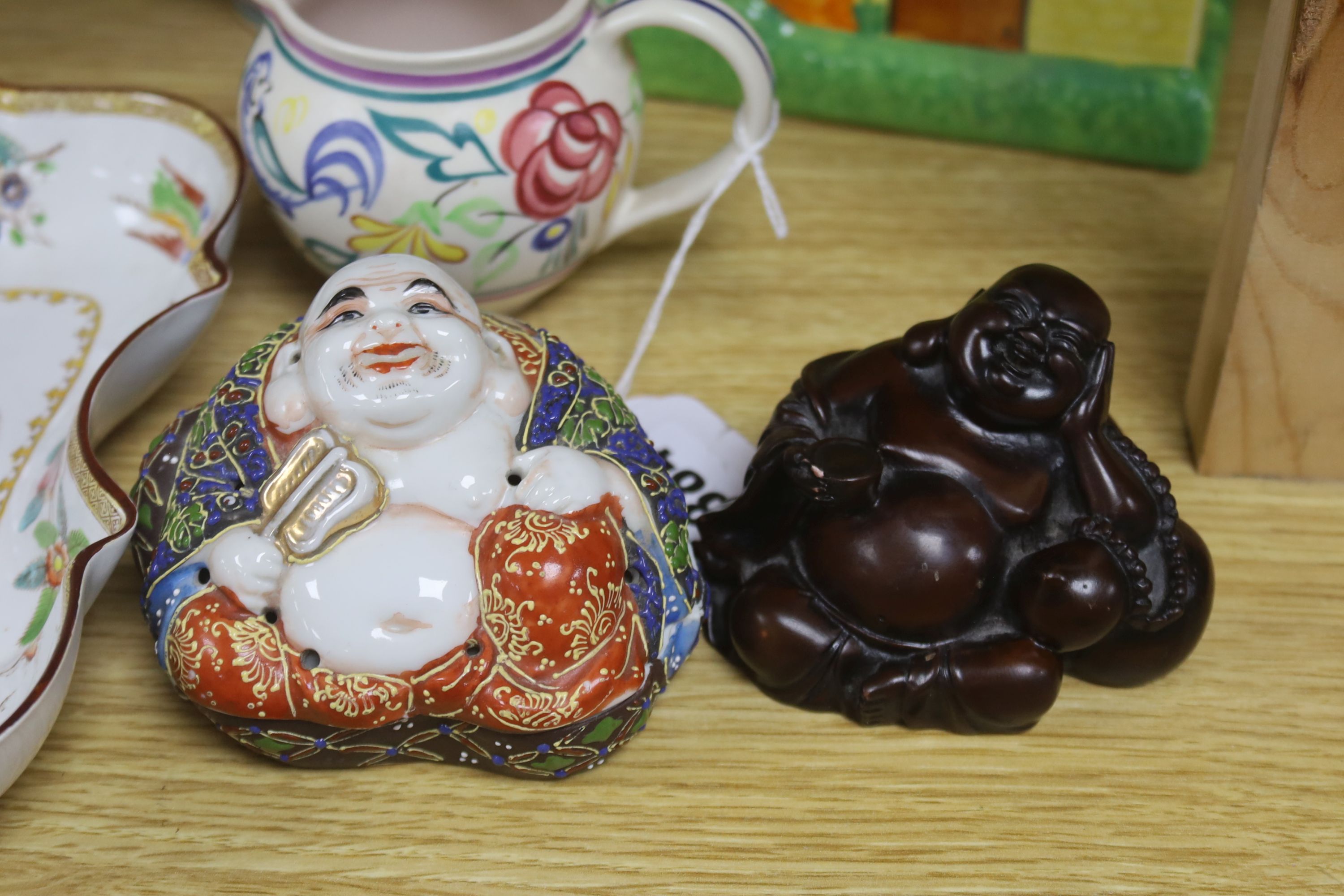 A Carltonware biscuit barrel, Poole polychrome, Beswick, Doulton ware, etc.